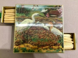 Old matches in a hologram box-holder