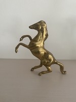 Copper prancing horse statue