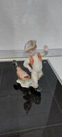 Porcelain figurine of a boy with a rooster from Herend