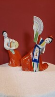 North Korea - (Kndk) is a real rarity. 2 Porcelain statue of a lady with drum and fan. Marked manual fe