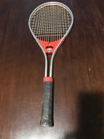 Stomil brand metal frame tennis racket. The red plastic part is damaged, but it does not move. Made in Poland