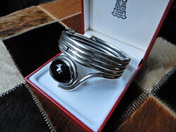 Old, special silver bracelet with a large onyx stone
