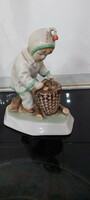 Zsolnay porcelain figurine collecting coins