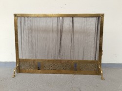 Antique brass stove embers in front of fireplace with retractable braid net 613 8587