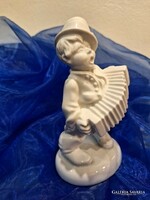 Porcelain accordion boy from Herend