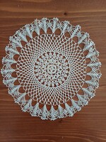 Delicate crocheted lace tablecloth