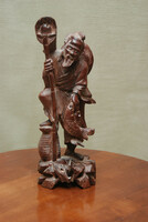 Far Eastern fisherman exotic wooden sculpture