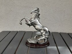 Equestrian statue on a ceramic plinth