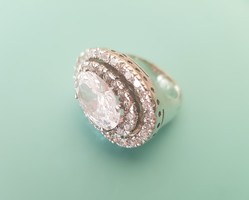 A wonderful silver ring with an old royal look and lots of sparkle