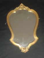 Baroque mirror with antique wooden frame, the frame has antique gilding