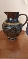 A wonderful ceramic peacock eye jug