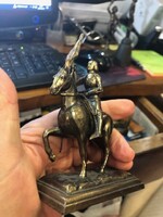 Equestrian statue made of copper alloy, 14 cm in size.