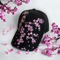 Baseball cap decorated with hand painting