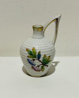 A small ribbed vase with pointed ears and a Victoria pattern from Herend