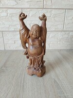 Carved standing Buddha statue