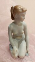 Aquincum porcelain kneeling female nude statue.
