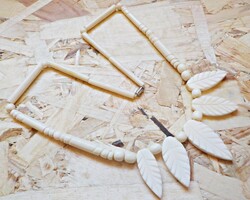 Leaf necklaces carved from old bone