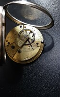 Silver pocket watch with chain drive mechanism. (Spindle)