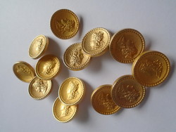 13 Pcs. New stable metal buttons depicting a mythological head.