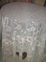 Beautiful fabric made of elegant curtains embroidered in Madeira