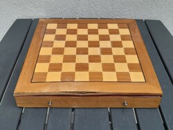 Wooden chess set with storage board