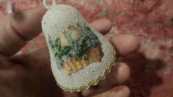 A retro Christmas tree decoration made of some kind of foamed plastic. Very nostalgic, but not antique.