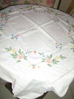 Beautiful vintage pastel colored embroidered floral tablecloth