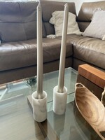 2 white marble candle holders for sale.