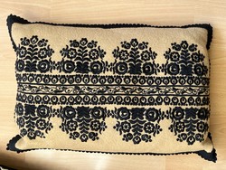 Black and brown embroidered decorative pillow