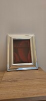Silver-plated picture frame.