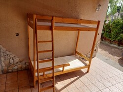 Brand new, complete, natural pine color, bunk bed.