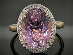 Kunzite 0.60 Ct gold ring with glasses. New. With certificate.