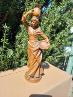 A lady carrying a jar! 30 Cm wooden statue!