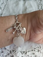 New handmade beautiful silver bracelet with charms and rose quartz stone for sale!