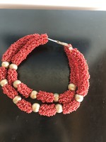Decorative, coral-colored, small-eyed pearl necklace, African traditional jewelry (baked)