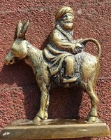 Funny scene riding a donkey - bronze statue