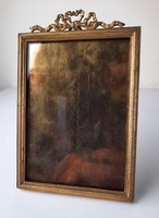 Classic bronze hanging and supporting picture frame