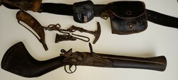 Antique flintlock rifle plus accessories.
