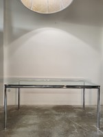 Modern, German dining table with chrome glass tubular frame