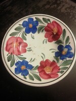 A small wall plate with a flower pattern, from Hólloháza, Wilhelmsburg?