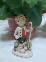 Hand painted porcelain figure.