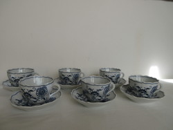 Old, marked, Meissen twisted-handled teacups, with coasters. Negotiable!