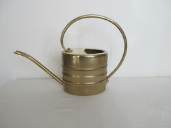 2 Liter, old brass watering can. Negotiable!