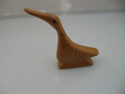 Small carved wooden bird