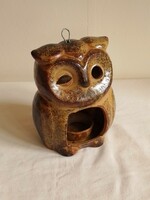 Old glazed ceramic candle holder, candle holder, in the shape of an owl figure, mood lighting