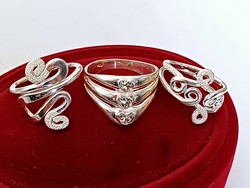 3 women's silver rings in one