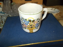 A very old Raven House mug