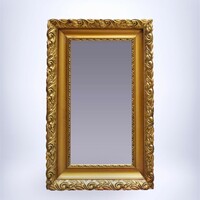 Classic framed wall mirror with gilded frame