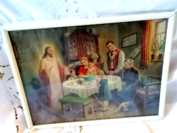 Old holy image under glass in a white wooden frame: 