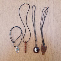 New figurative necklace on leather strap (dolphin, yin-yang, fox, threaded wood)